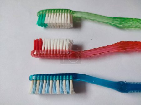 Toothbrushes on white background.