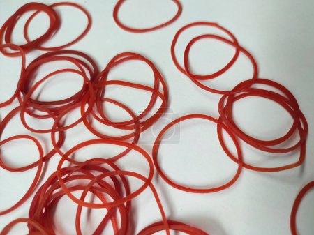 Red elastic rubber bands isolated on a white background
