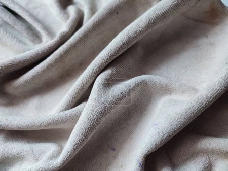 texture, motif, fond de serviette blanche sale exposée à la lumière du soleil