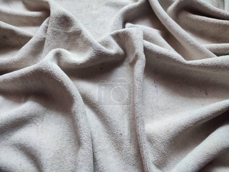 Foto de Textura, patrón, fondo de toalla blanca sucia expuesta a la luz solar - Imagen libre de derechos