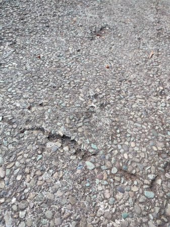 the texture and pattern of gravel or small cobblestone roads