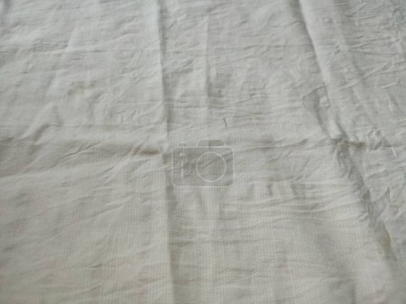 Tissu toile de fond toile de lin blanc froissé tissu de coton naturel lin naturel fait à la main vue du dessus fond bio Eco textiles blanc Tissu texture lin