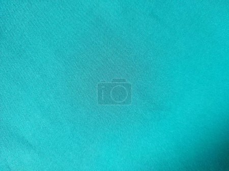 Cyan colored fabric texture and background