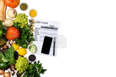 Photo for Organic healthy vegetables on isolated white background diet plan on the sheet copy space flat lay. - Royalty Free Image