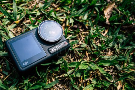 Photo for Cundinamarca, Colombia - January 24 2024: GoPro dji osmo action 4 action camera in a forest with plants and grass ready to record a video. Action Camera in Extreme Conditions - Royalty Free Image