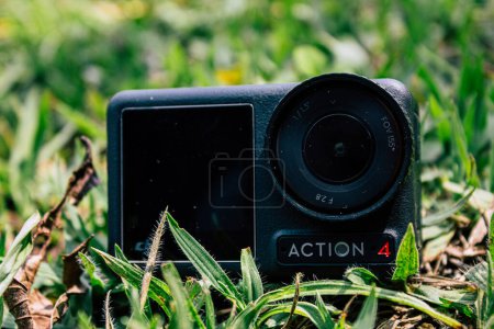 Photo for Cundinamarca, Colombia - January 24 2023: GoPro dji osmo action 4 action camera in a forest with plants and grass ready to record a video. Action Camera in Extreme Conditions - Royalty Free Image
