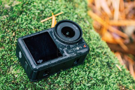 Photo for Cundinamarca, Colombia - January 24 2024: GoPro dji osmo action 4 action camera in a forest with plants and grass ready to record a video. Action Camera in Extreme Conditions - Royalty Free Image
