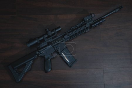 Photo for Civilian weapon, tactical rifle with optical sight, flashlight and laser for home defense and shooting range. High quality photo - Royalty Free Image