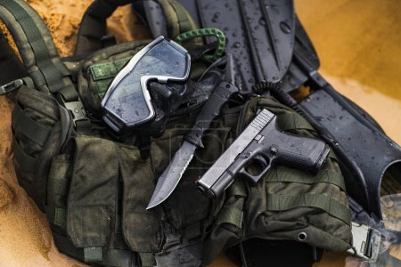 Photo for Military diver's equipment, pistol, knife, body armor, fins, mask. High quality photo - Royalty Free Image