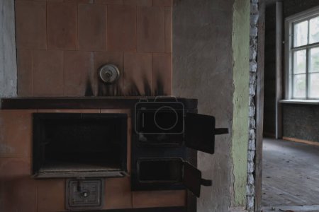 Wood stove in an old abandoned house. 