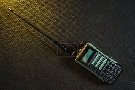 Portable modern military radio, walkie talkie with antenna. 