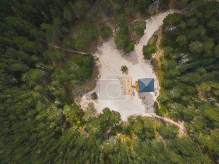 Observation tower at Rannamets swamp in Estonia in summer, photo from above from a drone. 
