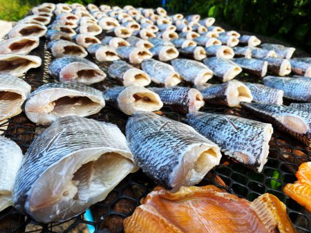 Photo for Nile tilapia fish sun dried salted fish. Nile tilapia fish sun dried. - Royalty Free Image