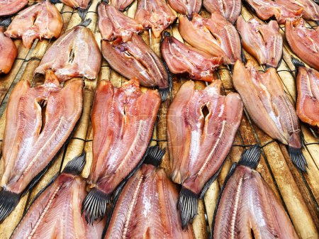 Photo for Dried common snakehead fish in the open market, Thailand. - Royalty Free Image