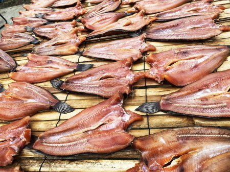 Photo for Dried common snakehead fish in the open market, Thailand. - Royalty Free Image