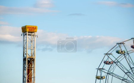 Photo for Double Shot and Ferris Wheel Amusement Park Ride at Ocean City, New Jersey Boardwalk - Royalty Free Image