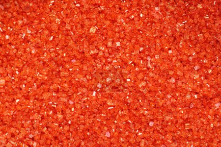 Gros plan sur les cristaux de sucre rouge