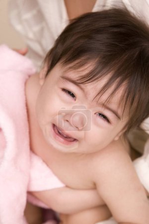 Photo for Close up portrait of crying little asian girl - Royalty Free Image