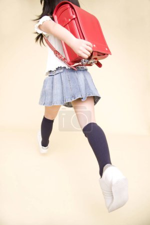 Photo for Girl student with backpack - Royalty Free Image