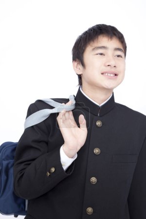 Photo for Portrait of Japanese school boy posing on white studio background - Royalty Free Image