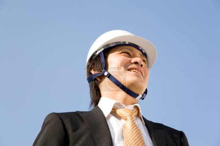 Happy and success Japanese construction worker
