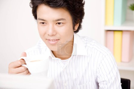 Photo for Portrait of handsome young asian businessman at office - Royalty Free Image