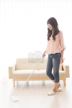 Photo for Asian woman mopping the floor - Royalty Free Image