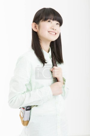 Photo for Studio portrait of smiling Asian girl - Royalty Free Image