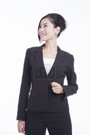 Photo for Young japanese businesswoman in casual suit standing on white studio background - Royalty Free Image