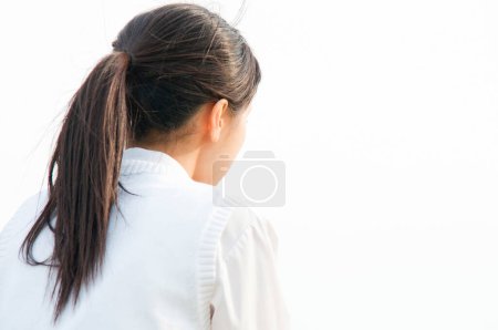 Téléchargez les photos : Vue arrière de femme asiatique avec queue de cheval - en image libre de droit
