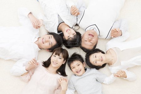 Photo for Happy asian family at home - Royalty Free Image