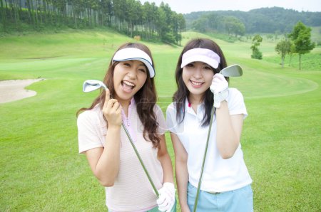Téléchargez les photos : Gros plan asiatique femmes joueurs de golf - en image libre de droit