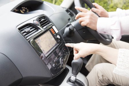 Téléchargez les photos : Man holding steering wheel in the car. - en image libre de droit