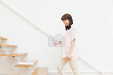 Photo for Woman cleaning house with mop - Royalty Free Image