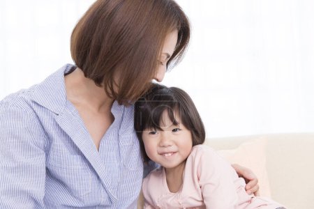 Photo for Asian young mother and daughter spending time together - Royalty Free Image