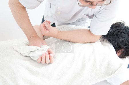 Photo for Man having massage at spa - Royalty Free Image