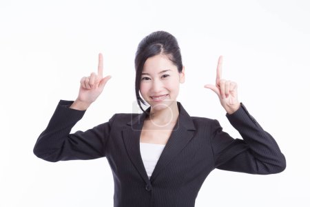 Photo for Studio portrait of young asian businesswoman pointing - Royalty Free Image