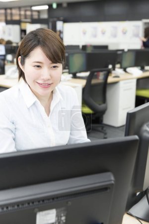Photo for Asian business woman at work - Royalty Free Image