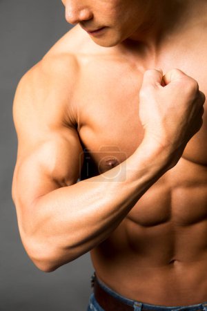 Photo for Portrait of man with muscular body and no shirt - Royalty Free Image