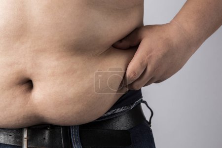 Photo for Fat man with big belly. overweight man. studio portrait - Royalty Free Image