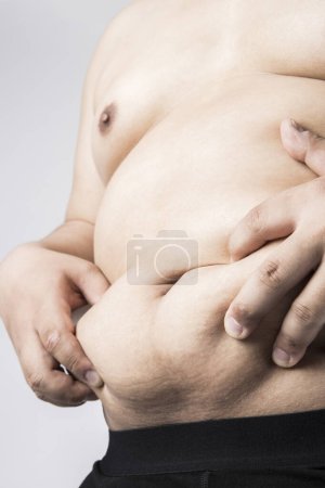 Photo for Fat man with big belly. overweight man. studio portrait - Royalty Free Image