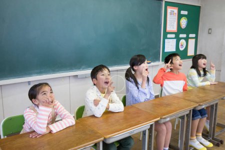 Photo for Portrait of asian children in school classroom - Royalty Free Image