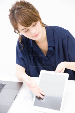 Photo for Woman with a digital tablet - Royalty Free Image