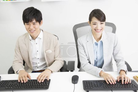 Photo for Asian business team working in office - Royalty Free Image