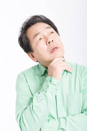 Foto de Retrato de un hombre asiático que está pensando - Imagen libre de derechos