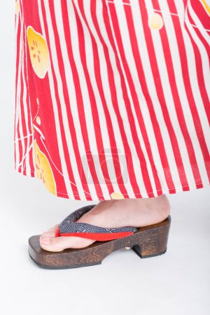 Photo for Women in wooden traditional japanese shoes - Royalty Free Image