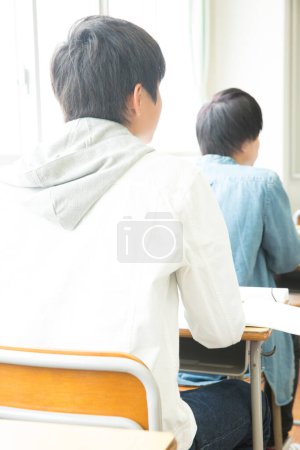 Photo for Asian students studying in classroom - Royalty Free Image