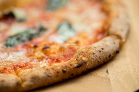 Photo for Pizza with cheese, tomato sauce and basil - Royalty Free Image