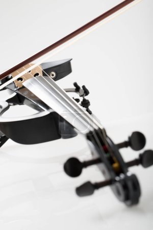 close up black violin on white background