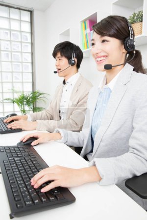 Photo for Portrait of smiling customer service operators - Royalty Free Image